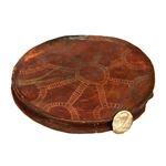 Historie piercingu - hliněná destička do rtu (Afrika)